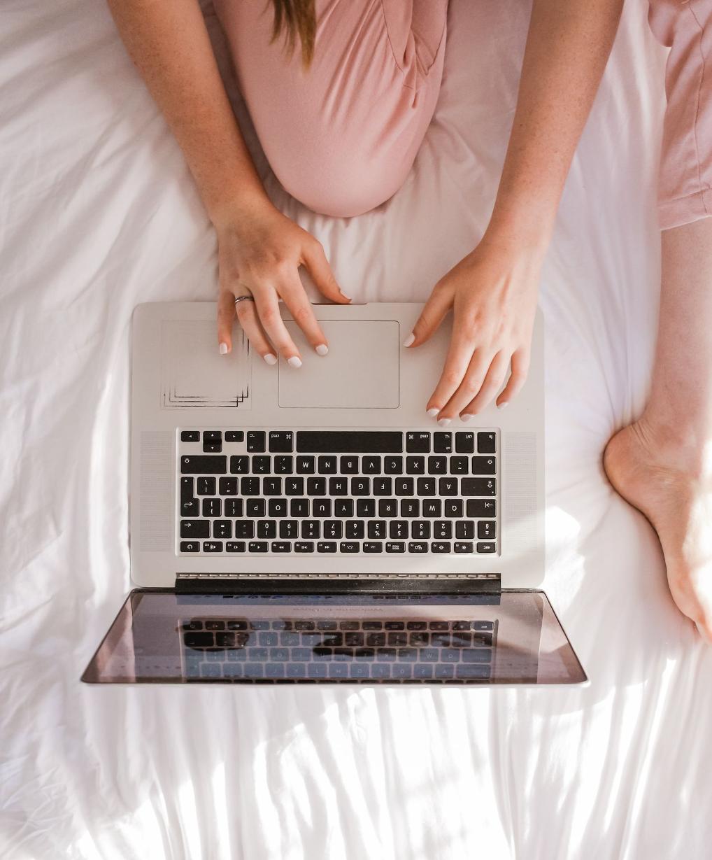 woman using MacBook Pro